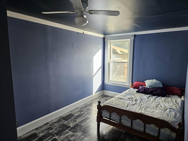 bedroom featuring ceiling fan and ornamental molding