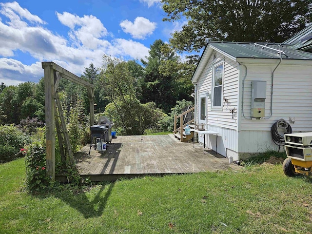 view of yard with a wooden deck