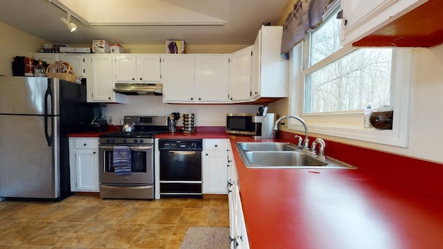 kitchen with white cabinetry, sink, and stainless steel appliances