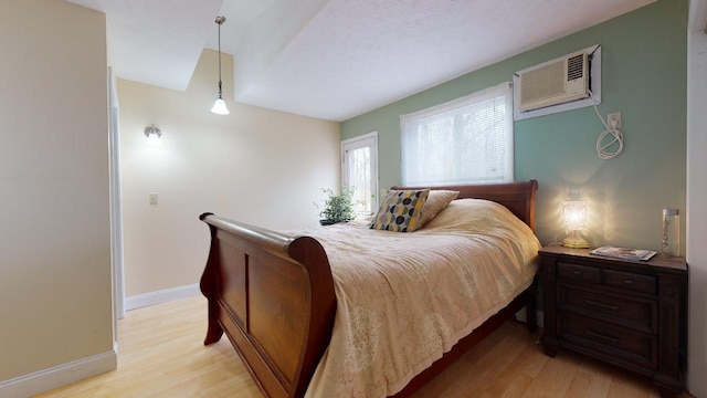 bedroom featuring light hardwood / wood-style flooring