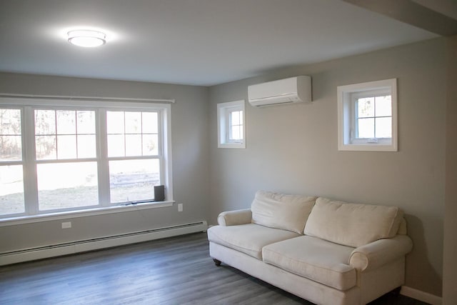 living room with a wall mounted AC, dark hardwood / wood-style floors, and a baseboard heating unit