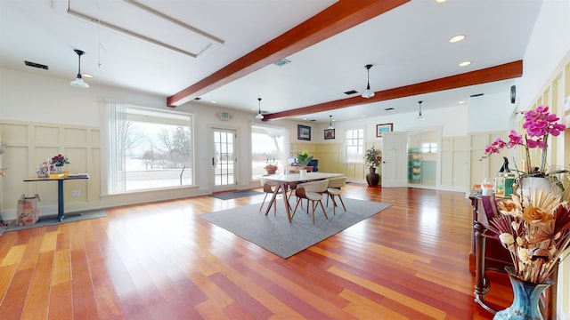 1091 US Route 2, North Hero, VT 05474 - dining room with beamed ceiling, ceiling fan, and light hardwood / wood-style flooring