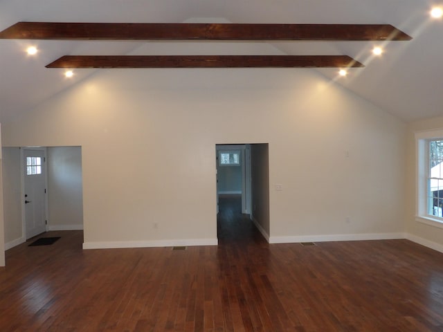 empty room featuring beamed ceiling, dark wood-type flooring, and high vaulted ceiling