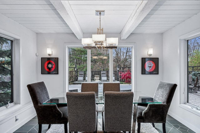 tiled dining room with beamed ceiling, an inviting chandelier, and wood ceiling