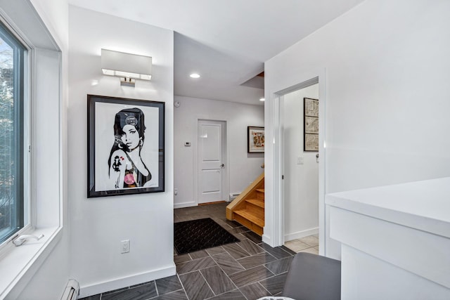 entryway featuring a baseboard radiator