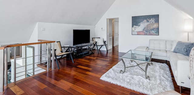 living room with lofted ceiling and dark hardwood / wood-style floors