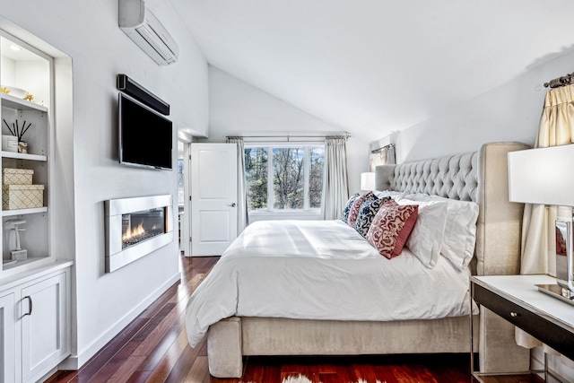 bedroom with dark hardwood / wood-style flooring, a wall unit AC, and vaulted ceiling