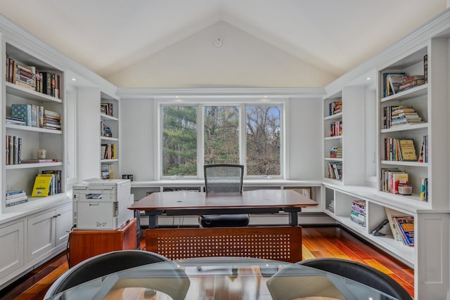 office area featuring built in features, dark hardwood / wood-style flooring, and lofted ceiling