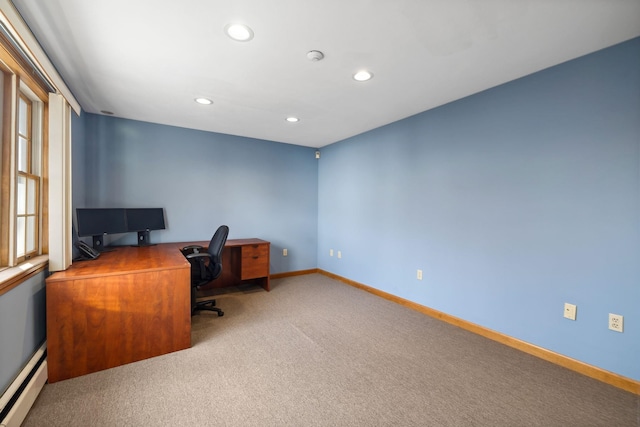 carpeted office featuring baseboard heating