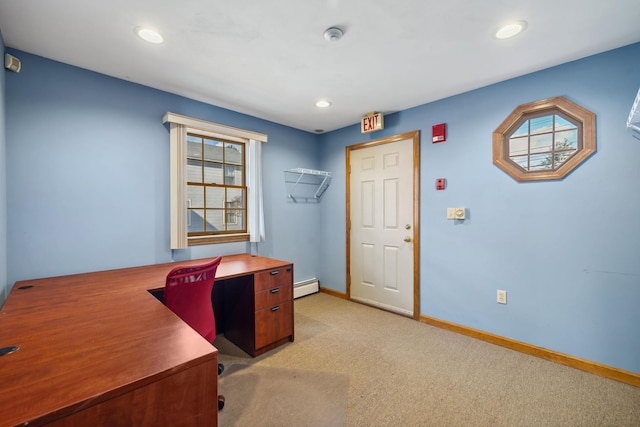 office area with light carpet and a baseboard radiator