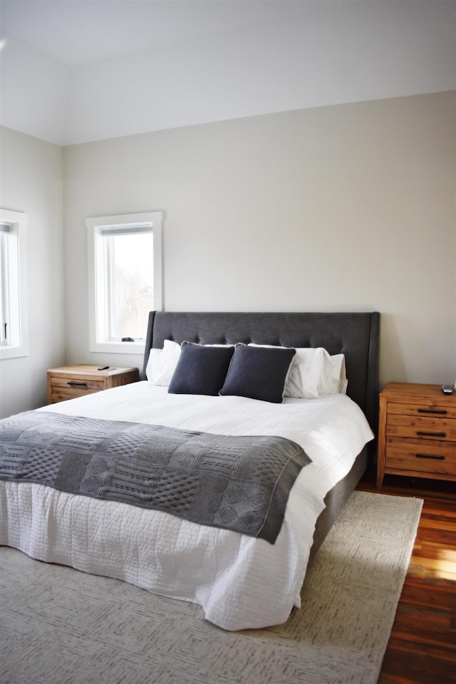 bedroom featuring dark hardwood / wood-style flooring