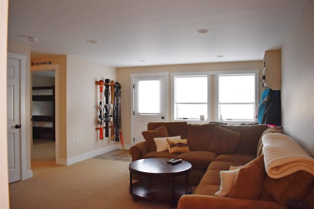 living room featuring light carpet