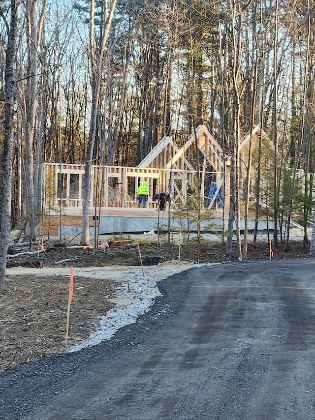 view of front of property featuring a playground