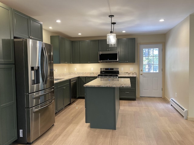 kitchen featuring a baseboard radiator, decorative light fixtures, a kitchen island, light stone counters, and stainless steel appliances