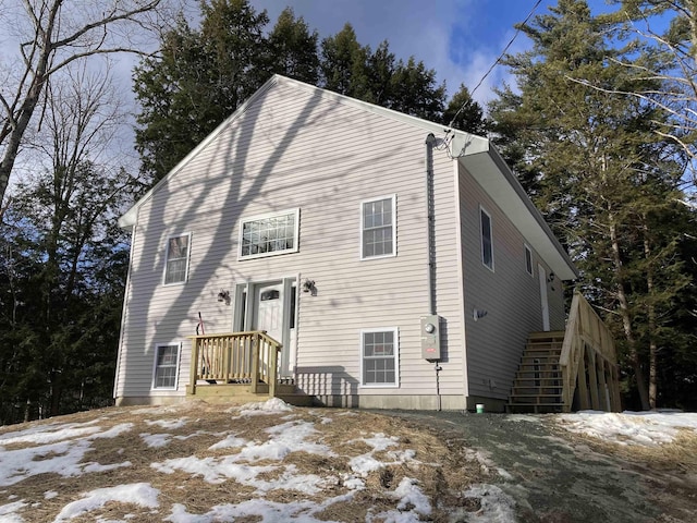 view of snow covered house