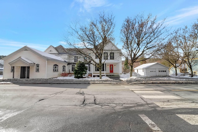 view of front of house featuring an outbuilding and a garage