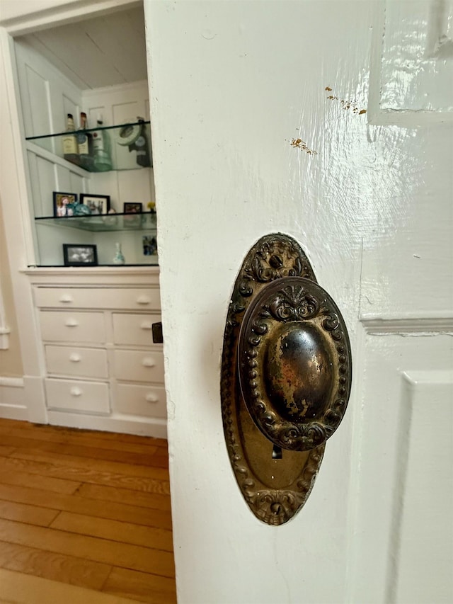 interior details featuring wood-type flooring