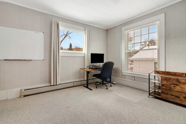 carpeted office featuring plenty of natural light, ornamental molding, and a baseboard radiator