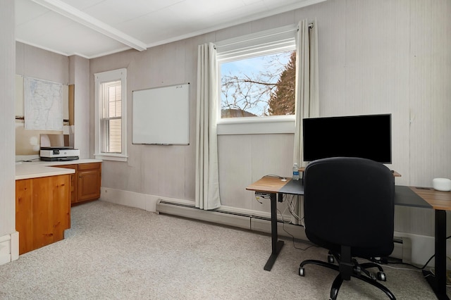 office area featuring light carpet and a baseboard radiator