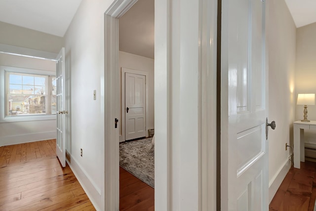 corridor featuring light hardwood / wood-style floors