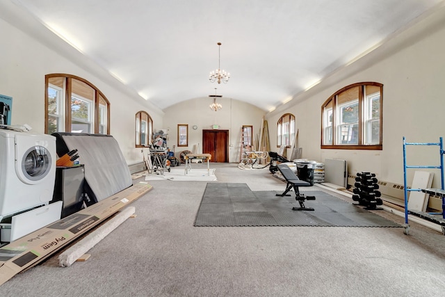 exercise room with stacked washer and dryer, light colored carpet, lofted ceiling, and an inviting chandelier