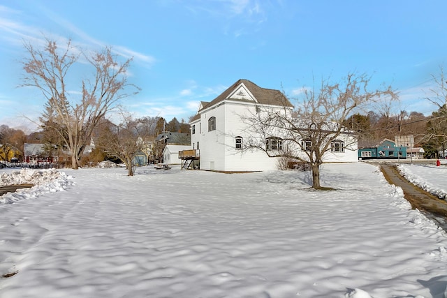 view of snow covered property