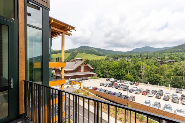 balcony featuring a mountain view