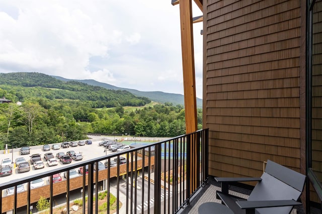 balcony featuring a mountain view