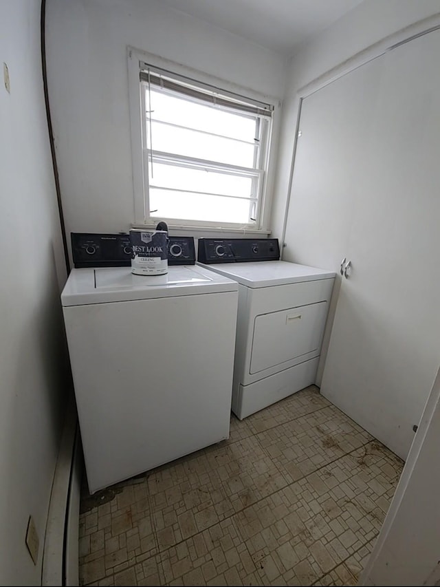 laundry room with washing machine and dryer