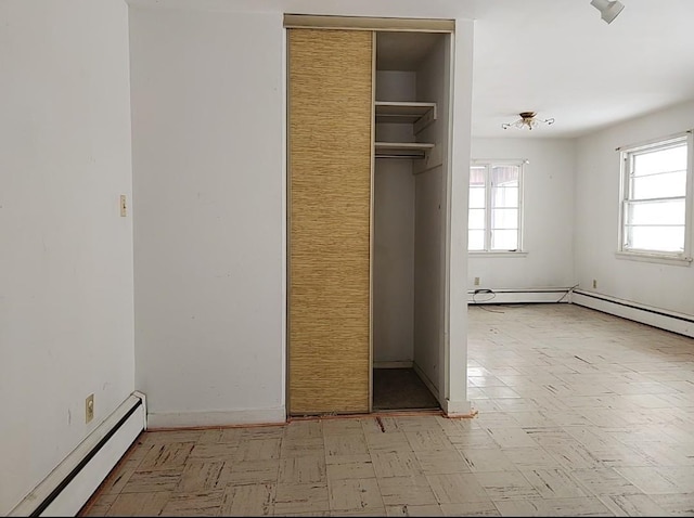 closet with baseboard heating