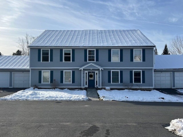 colonial home featuring a garage