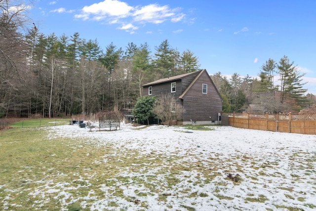 view of yard covered in snow