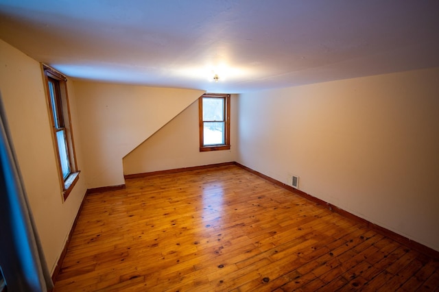 unfurnished room featuring light hardwood / wood-style floors