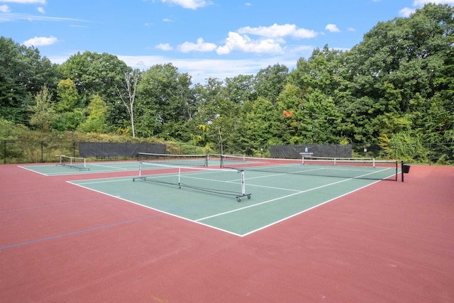 view of sport court with basketball hoop