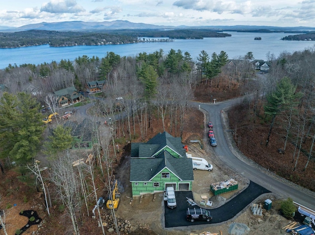 bird's eye view with a water and mountain view