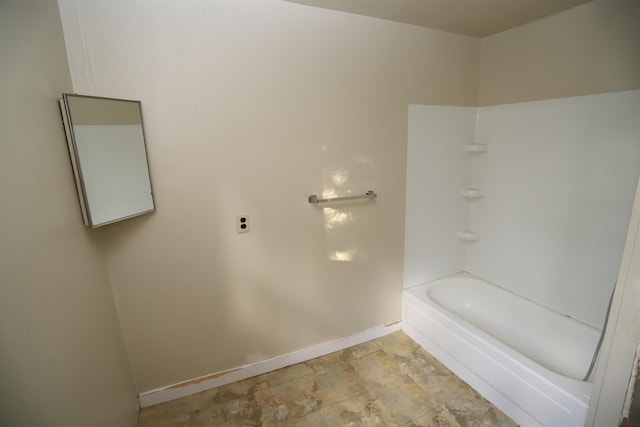 bathroom with shower / tub combination