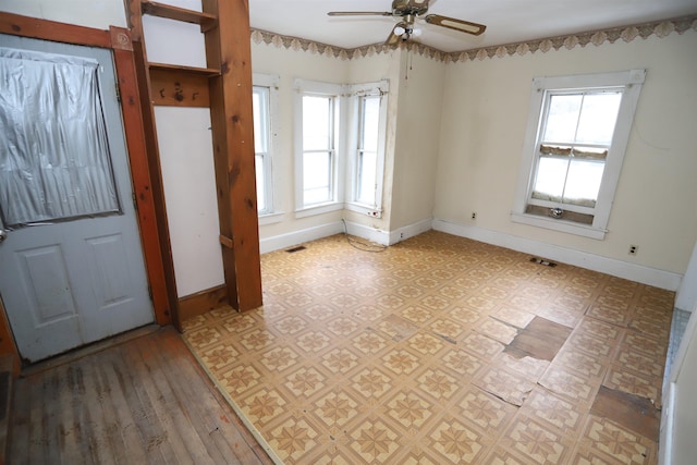 entryway featuring ceiling fan and light hardwood / wood-style floors