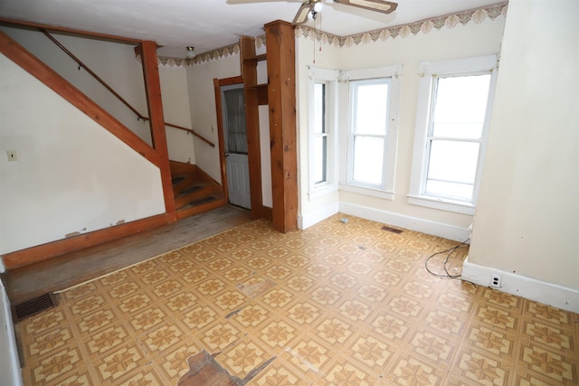 spare room featuring ceiling fan