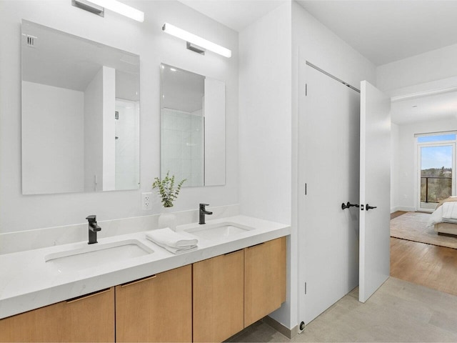 125 Cambrian Way Unit 609, Burlington, VT 05401 - full bathroom with double vanity and connected bathroom