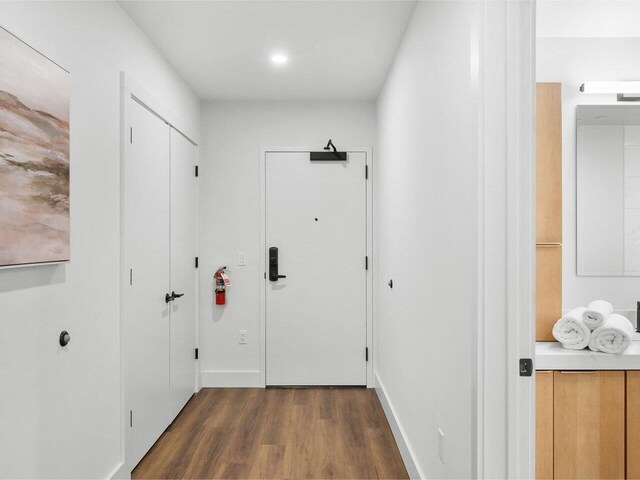 125 Cambrian Way Unit 609, Burlington, VT 05401 - hallway featuring wood finished floors