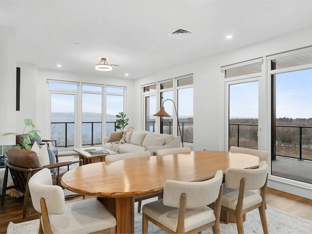 125 Cambrian Way Unit 609, Burlington, VT 05401 - dining room with wood finished floors, recessed lighting, and a water view