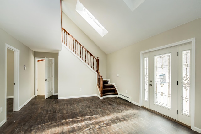 entryway with lofted ceiling with skylight, dark hardwood / wood-style flooring, and a baseboard heating unit