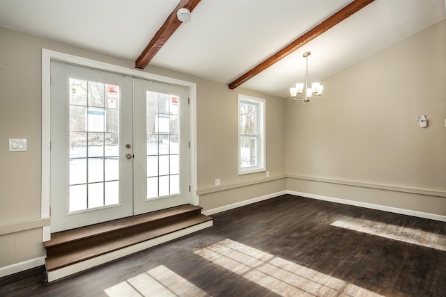 doorway featuring a chandelier, french doors, dark hardwood / wood-style flooring, and lofted ceiling with beams