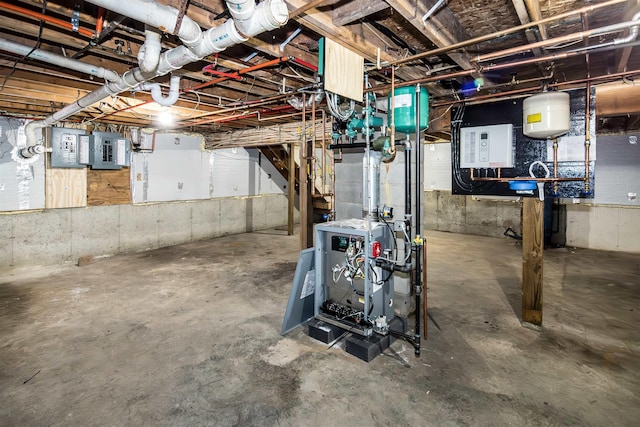 basement featuring electric panel