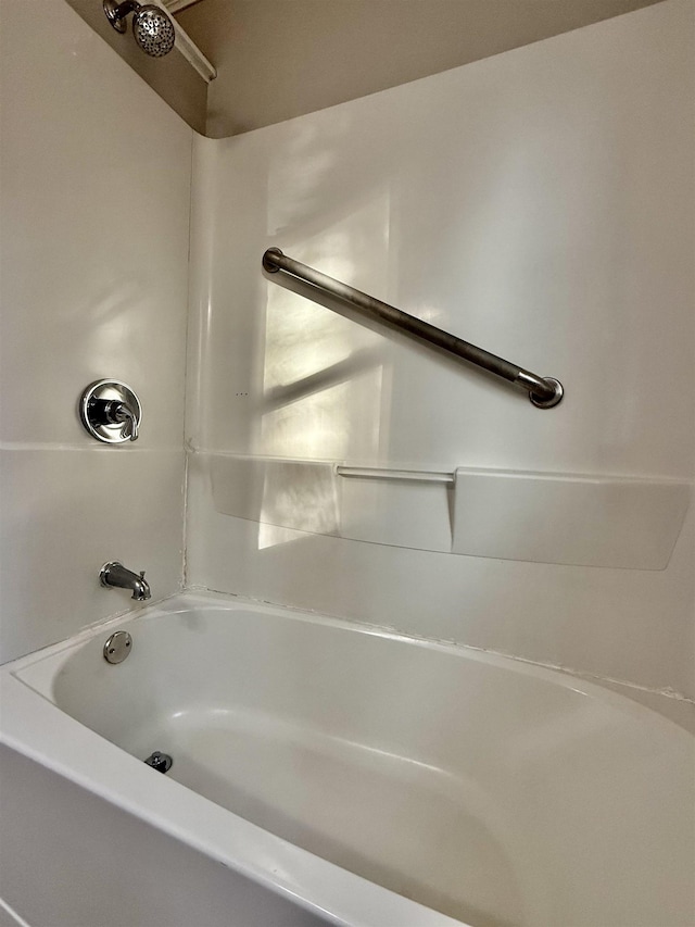 bathroom with shower / bath combination