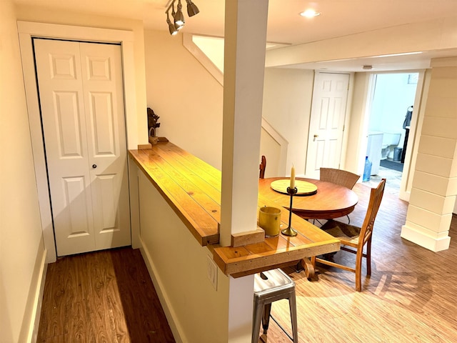 dining area with hardwood / wood-style flooring