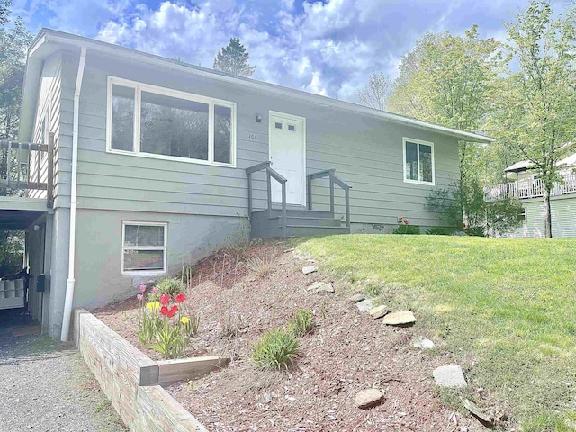 view of front of home with a front yard