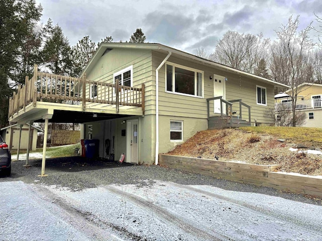 view of front of house featuring a shed and a deck