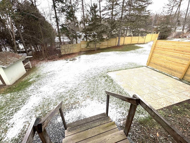 view of yard covered in snow