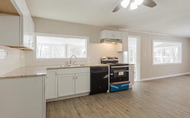 kitchen featuring dishwasher, electric range oven, a healthy amount of sunlight, and sink